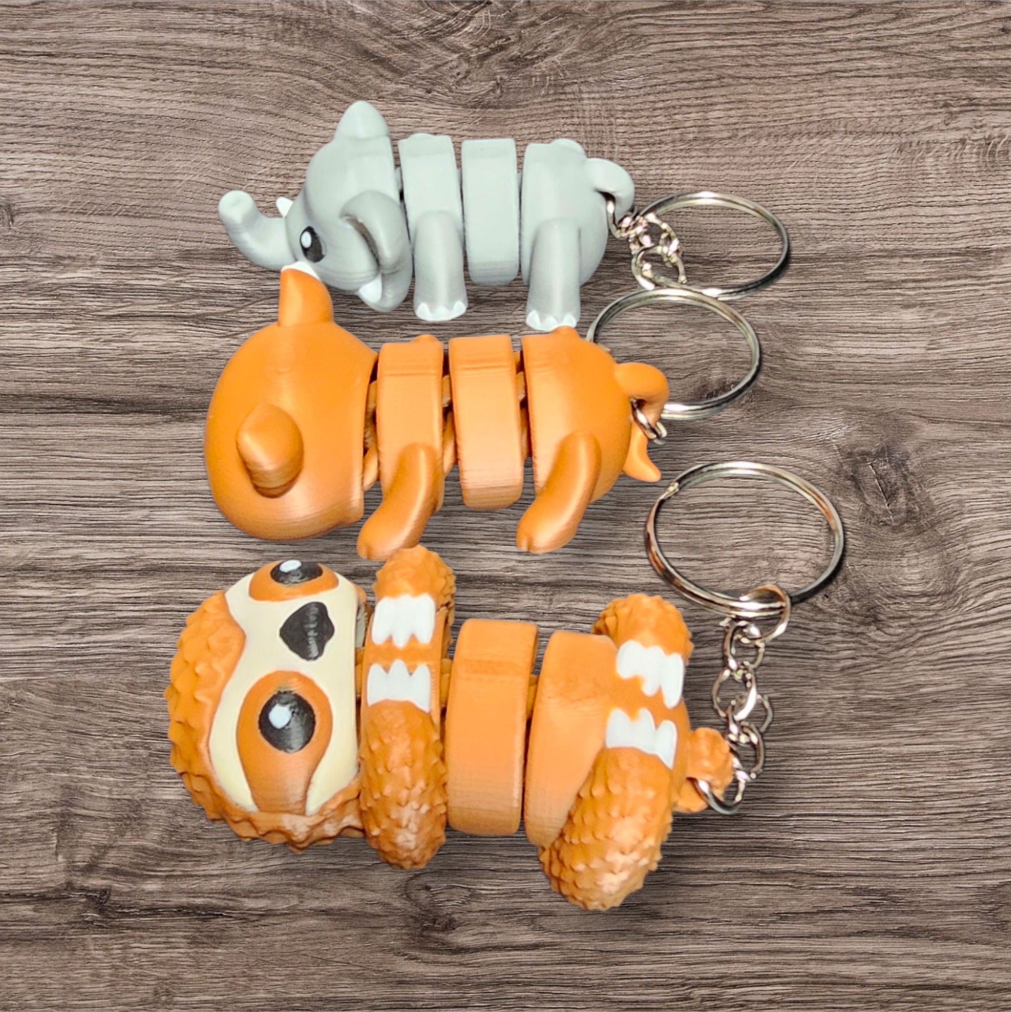 Flexi Pet, Sloth, Cat, and Elephant Keychains 3 PACK - 3 Printed