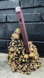 Skull Pile Phone Stand – Hand Painted, 3D Printed Gothic Desk Accessory (Pewter or Gold)